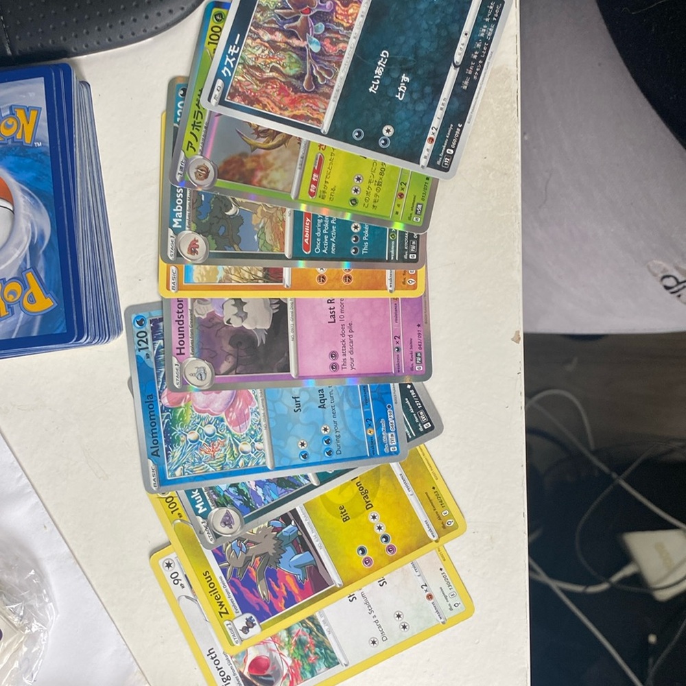 Pokemon Trading Cards Assortment - Blue, Yellow, Pink, Green